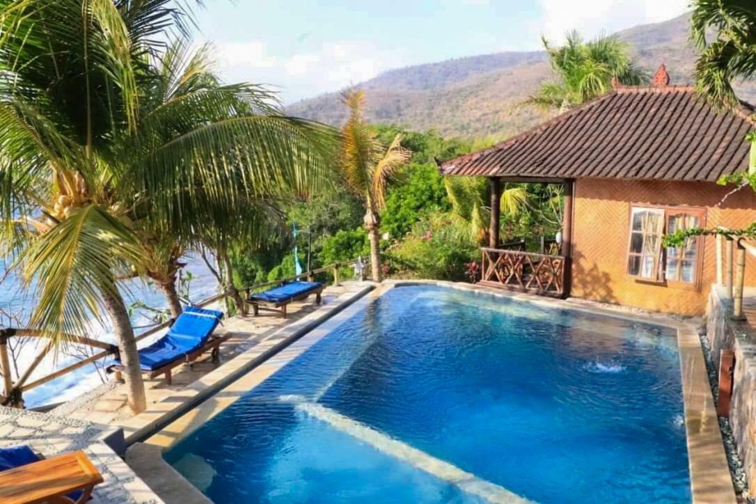 Eka Purnama Cottages Амед Екстер'єр фото